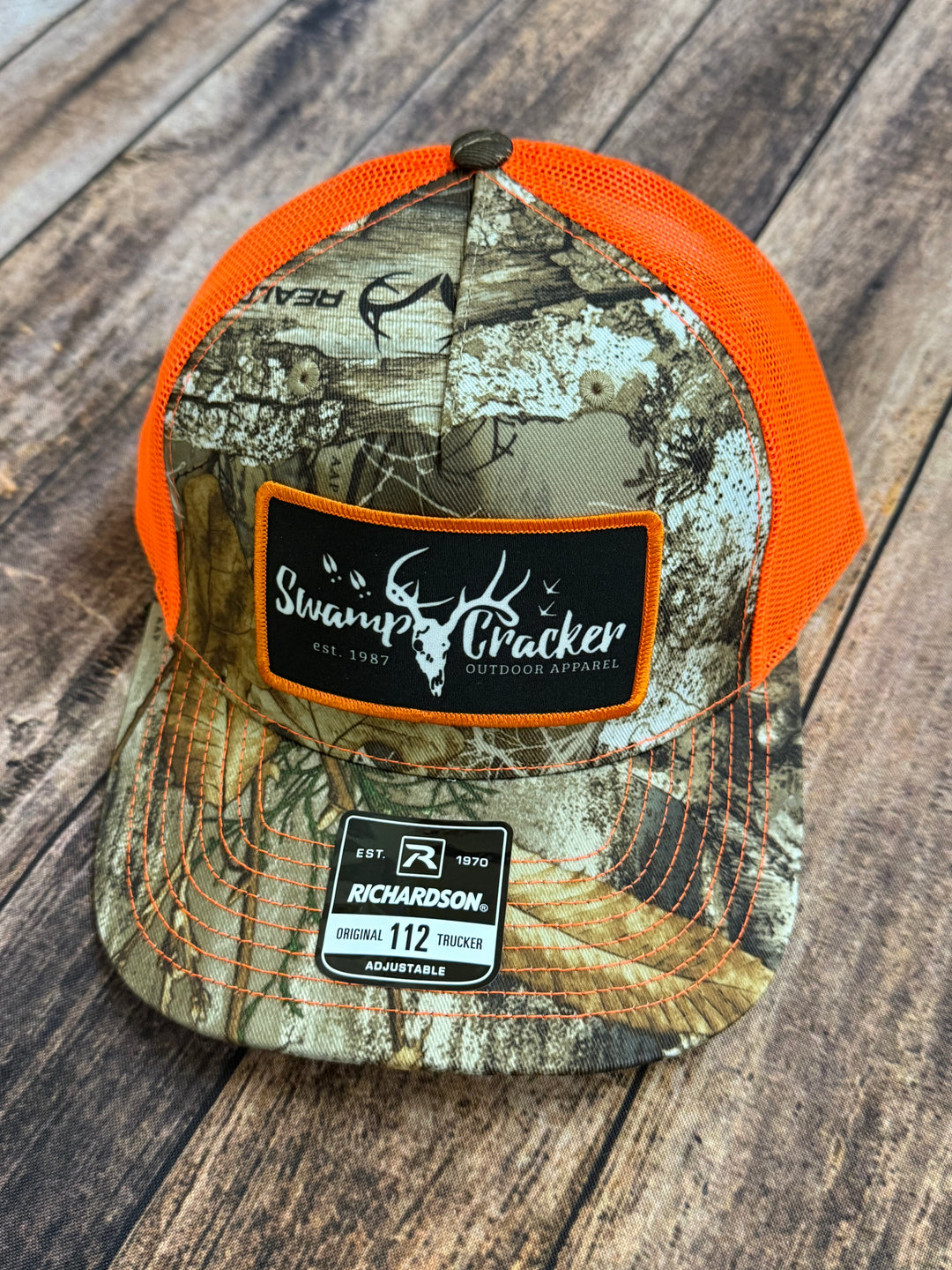 Camo Swamp Cracker Orange Logo Patch hat